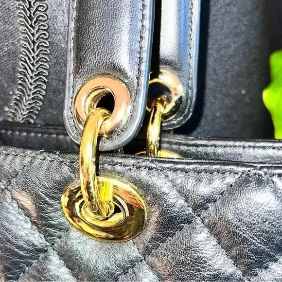 St. John Women's Black Leather Quilted Handbag
Purse Gold Tone hardware W/ Charm - Picture 6 of 16